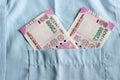 New 2000 rupee notes in an Indian mans shirts front pocket. Royalty Free Stock Photo