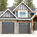 House Home Exterior Gray Siding Double Garage Royalty Free Stock Photo