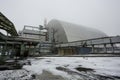 New Safe Confinement above remains of reactor 4 and old sarcophagus at Chernobyl nuclear power plant. Ukraine Royalty Free Stock Photo