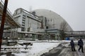 New Safe Confinement above remains of reactor 4 and old sarcophagus at Chernobyl nuclear power plant. Ukraine. Royalty Free Stock Photo