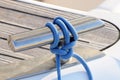 New sailboat knight with blue line, equipment for keeping ropes Royalty Free Stock Photo