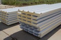 New sandwich panels for mounting the walls of the building. New material for insulating the walls of the building under