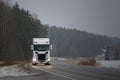 New Scania Trucking Through Winter Fog Royalty Free Stock Photo