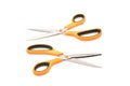 New scissor with orange and black color on handle isolated on white Royalty Free Stock Photo