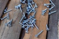 New screws on old wooden boards Royalty Free Stock Photo