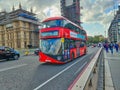 New shape Red London Routemaster bus on Westminster bridge