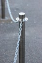 New shiny safety bollard with two new shiny chains