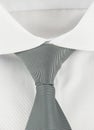 New shirt with a grey striped necktie Royalty Free Stock Photo