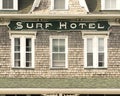 A close up view of the iconic Surf Hotel sign, belonging to the present day