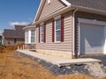 A new sidewalk by a home construction Royalty Free Stock Photo