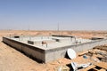 New small house construction in the middle of the desert. Royalty Free Stock Photo