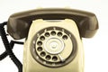 New smart phone with old telephone on white background. New communication technology Royalty Free Stock Photo