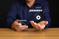 New software updates or data uploads. Smartphone users are installing the update process to improve functionality Royalty Free Stock Photo
