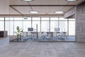 New spacious glass office interior with furniture and large panoramic windows with city view. Royalty Free Stock Photo