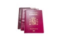 New spanish passport over old expired ones and white background