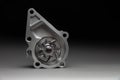 New spare part on a gradient gray background7 Internal combustion engine cooling system pump Royalty Free Stock Photo