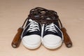 New sports shoes and jumping rope with wooden handles Royalty Free Stock Photo