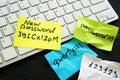 New strong password and weak ones near keyboard. Royalty Free Stock Photo