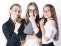 New student bookwarm in glasses against casual group on white background, teen drama, lifestyle people concept Royalty Free Stock Photo