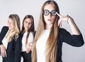 New student bookwarm in glasses against casual group on white background, teen drama, lifestyle people concept Royalty Free Stock Photo