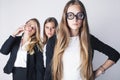 New student bookwarm in glasses against casual group on white background, teen drama, lifestyle people concept Royalty Free Stock Photo