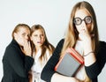 New student bookwarm in glasses against casual group on white, t Royalty Free Stock Photo