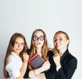 New student bookwarm in glasses against casual group Royalty Free Stock Photo