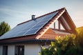 New suburban house with a photovoltaic system on the roof. Modern eco friendly passive house with solar panels on the Royalty Free Stock Photo