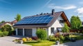 New suburban house with a photovoltaic system on the roof. Modern eco friendly passive house with solar panels on the gable roof, Royalty Free Stock Photo
