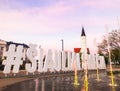 New Sun city Siauliai monument with beautiful cathedral and fountain Royalty Free Stock Photo