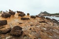 Diversity Of Tourists Walking In Yehliu Geopark, A Cape On The North Coast Of Taiwan. A Landscape Of Honeycomb And Mushroom Rocks.