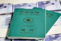 New Taiwan Dollars in stacks with ROC passport Royalty Free Stock Photo