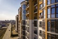 New tall apartment buildings and parked cars and suburb houses on blue sky copy space background Royalty Free Stock Photo