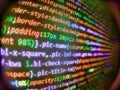 New technology revolution. Computer script typing work. Computer code program. Green fabric. Programmer working in computer screen Royalty Free Stock Photo