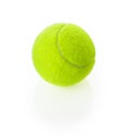 New tennis ball made of felt and rubber isolated on white background. Sports equipment of bright neon green yellow color. Design Royalty Free Stock Photo
