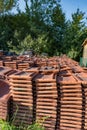 New terracotta tiles stacked on the street Royalty Free Stock Photo