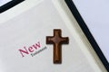 New testament cover in Holy Bible with a wooden cross Royalty Free Stock Photo