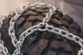 New tires with chains close up