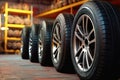 4 new tires that change tires in the auto repair service center Royalty Free Stock Photo