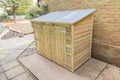 New tool shed in a garden. Royalty Free Stock Photo