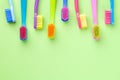 New Toothbrushes Set On Green Paper Background Royalty Free Stock Photo