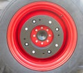 New tractor red tire wheel detail Royalty Free Stock Photo