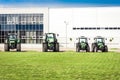 New tractors are standing next to the trading pavilion for sale in Kiev region, Ukraine