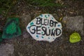 A new trend in Berlin, Germany - children lay colored stones along park paths in support of doctors fighting the new coronavirus C