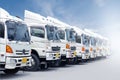 New truck fleet in the parking yard with beautiful blue sky Royalty Free Stock Photo