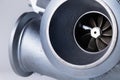 New turbocharged engine on a gray background. Impeller parts