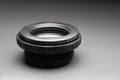 A new two-piece front strut support bearing. The new part is shown on a black gradient background. Royalty Free Stock Photo