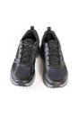 New unbranded running sneaker or trainer isolated on white background. Men`s black sport footwear. Close-up of a pair sneakers or Royalty Free Stock Photo