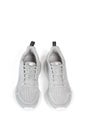 New unbranded running sneaker or trainer isolated on white background. Men`s light grai sport footwear. Close-up of a pair Royalty Free Stock Photo