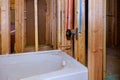 New under construction bathroom with interior framing of bathroom Royalty Free Stock Photo